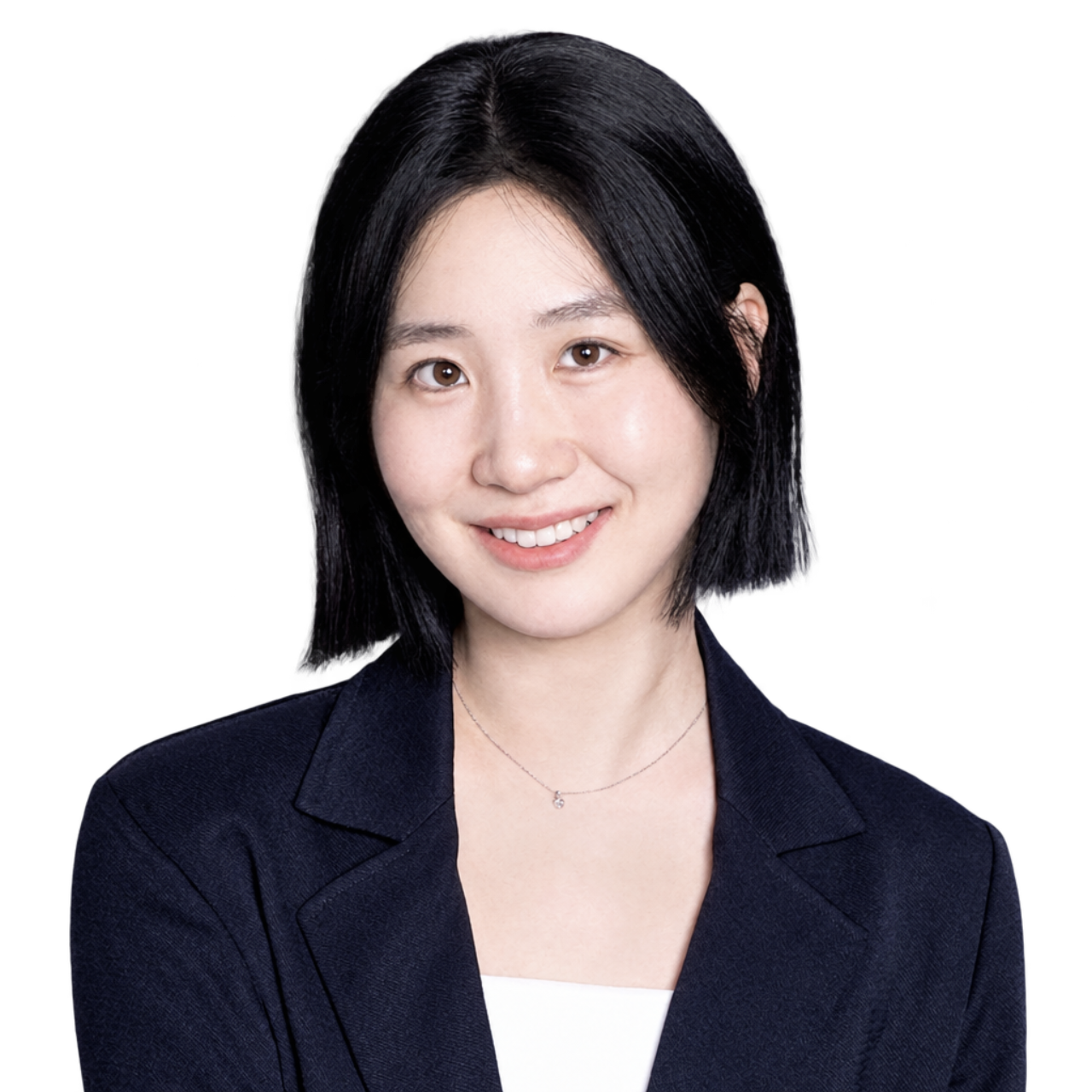Portrait of Inha Seo, smiling, in a navy blazer